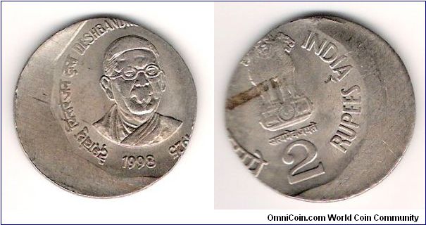 A gorgeous off centre strike from India, 2 Rupees.  

Deshbandhu Chittaranjan Das is pictured; he was a major figure in the Indian Independence movement.