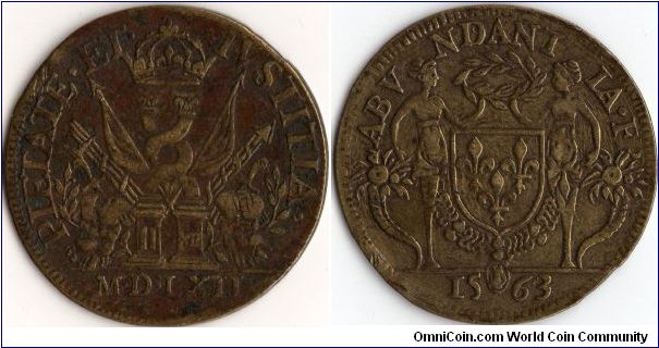 Error jeton from the early years of Charles IX. Strange in that it has been struck using two obverse dies. One side bears the die for 1562 in roman numerals (Feuardent 11669). The other side was struck using the die for 1563 (Feuardent 11690).