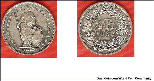 1/2 franc
medal alignment
22 stars around figure of Helvetia
copper-nickel