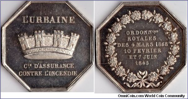 Silver jeton de presence issued for L'Urbaine, a french fire insurer. Lots of evidence of die breaks on reverse.