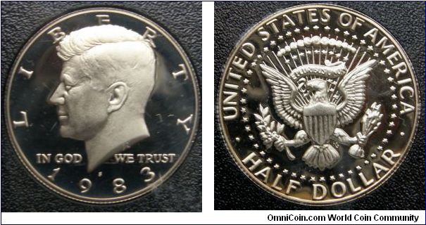 Kennedy Half Dollar. 1983S-Mintmark: S (for San Francisco, CA) centered above the date.Metal content:
Outer layers - 75% Copper, 25% Nickel
Center - 100% Copper. proof Set.