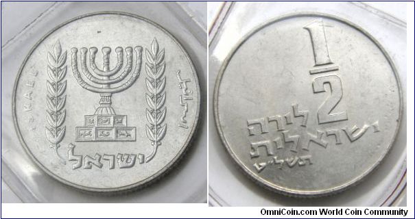 Half-Lira,Cupronickel. Reverse: Emblem of the state of Israel. Seven-branched candelabrum(menorah) of State Emblem, bas-relief of the Arch of Titus in Rome, depicting spoils from the Jerusalem Temple destroyed in 70 CE. 1979 Official Uncirculated Set'. coins w/o mint mark. The Jewish Year 5739 in Hebrew letters.