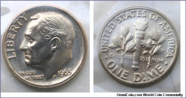 Roosevelt One Dime. Metal content:
Outer layers - 75% Copper, 25% Nickel
Center - 100% Copper. The San Francisco,California mint first struck the 1965  Special Mint Sets No Mint Mark.