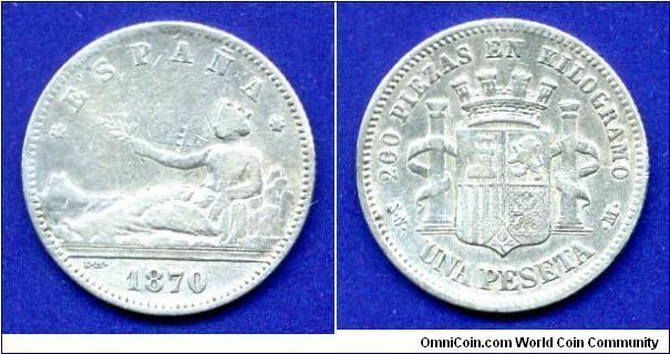 1 Peseta.
*ESPANA*.
1st Interregnum 1868-1871.
'M'- Madrid mint.


Ag835f. 5,0gr.