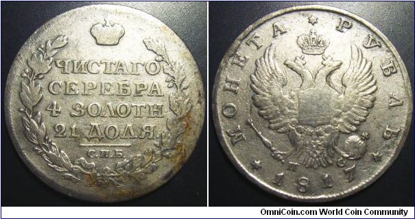 Russia 1817 1 ruble. Cleaned and supposedly found was in the sands along the coast of Connecticut while metal detecting. I initially misdiagnosed it as a re-engraved coin as the number 7 in 1817 is unusual. Turns out it's a genuine variety.