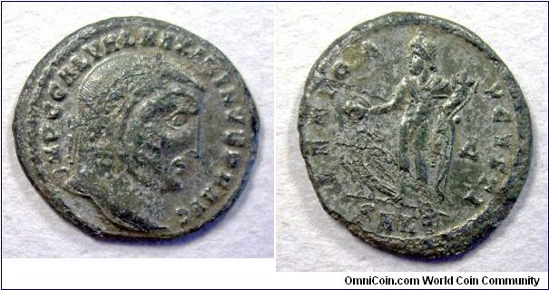 Maximinus II AE Follis. 313 AD. IMP C GAL VAL MAXIMINVS P F AVG, laureate head right / GENIO AVGVSTI, Genius standing left, naked but for chalmys over shoulder, holding cornucopiae and patera from which liquid flows, eagle below, Delta right, SMHT in ex. Mint of Heraclea