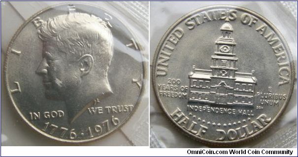 Kennedy Bicentennial Half Dollar. 1975 Mint Set. Mintmark: None (for Philadelphia, PA) centered above the date