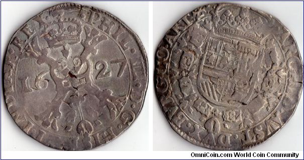 1627 silver Patagon from Artois (minted at Arras)in the then Spanish Netherlands, now France. Always very crudely struck. This one is actually a rather nice example.