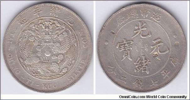 Ch'ing Dynasty Central Mint in Tientsin, milled coinage silver 'Kuang-hsu Yuan Bao', Emperor Kuang-hsu. This silver dollar with identification marks punched into the coin by Chinese merchants to indicate that the metal of the coin has been tested and is of a known quality. There are chopmarks of 'Golden coin' or Pecuniary (3 o'clock), 2 x 'Tien' (or Sky, 4 o'clock), chicken foot (10 o'clock), small edge cut (10 o'clock) on reverse. A crescent mark on obverse 10 o'clock. Cleaned. Good very fine.