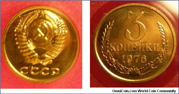 3 Kopeks (Brass) : 1961-1991
Obverse: Hammer and sickle overlain on globe above sun with rays, all within wreath or sheaf of wheat stalks, star above 
 CCCP 
Reverse: Denomination and date within wreath 
 3 KO?E?K? date 1976. 
1976 Proof-like Mint Set.