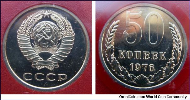 50 Kopeks, Obverse: Hammer and sickle overlain on globe above sun with rays, all within wreath or sheaf of wheat stalks, star above 
CCCP 
Reverse: Denomination and date within wreath 
50 KO?EEK date 1976. 1976 Proof-Like Mint Set.