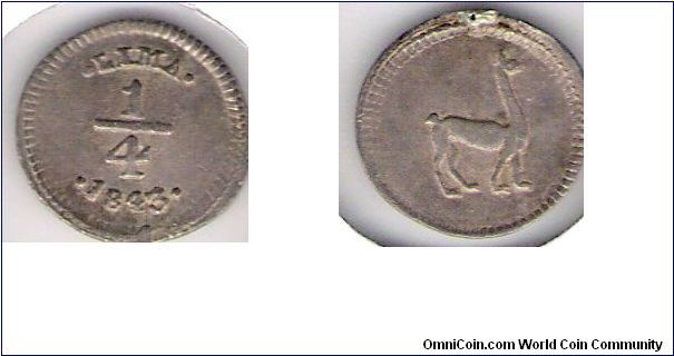 1/4 Real, Lima.  Damage at top was from a jewelery loop.

Coin Sold Nov/09