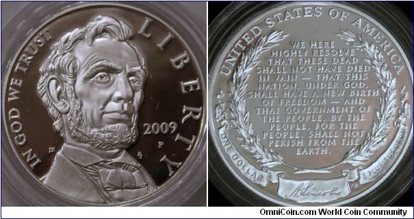 Abraham Lincoln 200th anniversary of his birth.  1 dollar commemorative, with famous words from his Gettysburg address and his signature on the reverse.  1.5 inches, Ag