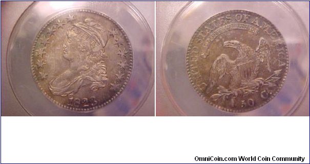 O-103, R.2, a very pretty example graded by ANACS as an AU-50.