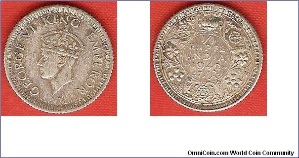 British India
1/4 rupee
George VI, king and emperor
small second head
reeded edge
0.500 silver
Calcutta Mint
