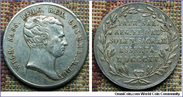 Coronation Medal 1815.  Wilhelm of Nassau. WILH. NASS. BELG. REX. LUXEMB. M. DUX  Bust R. . Rev. In Laurel Wreath  PATR. SAL. / REG. ET. ORD. / SOLEN. SACRAM. / ASSERTA. / MDCCCXV. Silver 23mm by Pierre Van De Goor