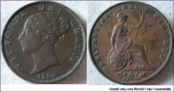 a nice 1854 halfpenny, a few die cracks on obverse and one large one near the G on REG