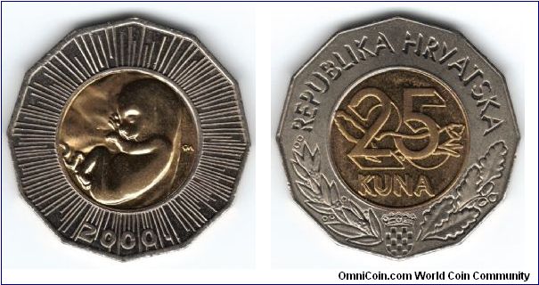The coin's core carries an image of a fetus as a universal symbol of human life which is a center of both the millennium that ends and the new millennium that begins. This is symbolized by a sequence of rays within the core of the coin's ring. The year 2000 is placed in the bottom, central part of the coin's ring.