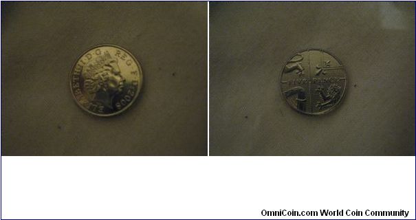 sheild 5p, slightly misaligned (was struck too high by a tiny ammount, noticable by rim thickness at top and bottom on reverse)