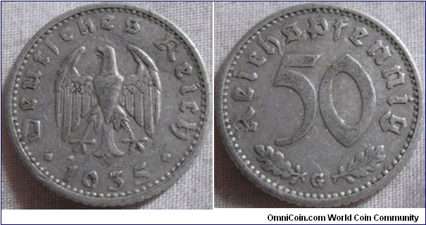 50 reichpfennig, minted in 1935, this coin was not put into circulation until 1939, this is the same design as the later issues but do not have the swastica