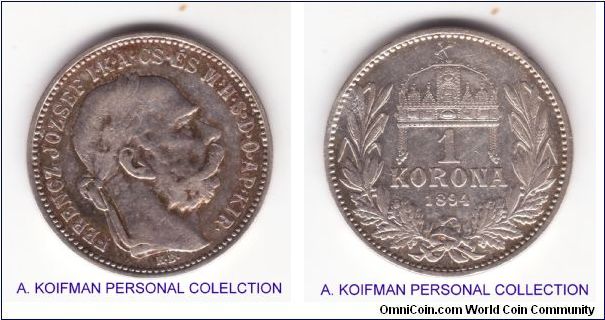 KM-484, 1894 Hungary (Austro-Hungarian Empire) corona;Kremnitz mint; shilling size silver coin with incused edge lettering; about very fine or higher coin, toned mostly on obverse.