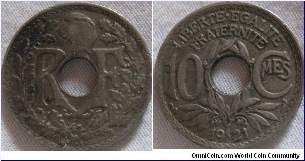 a nice 1921 10 centimes, looks to have a burn on the obverse, perhaps war damage