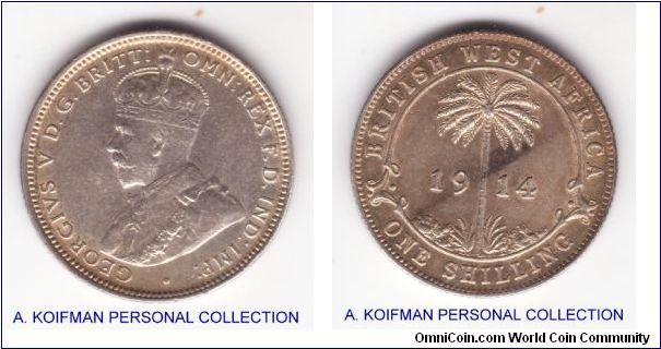 KM-12, 1914 British West Africa shilling; silver reeded edge, no mint mark which makes it royal mint; very fine on obverse and good very fine on reverse with very nice palm cluster and a small toning streak