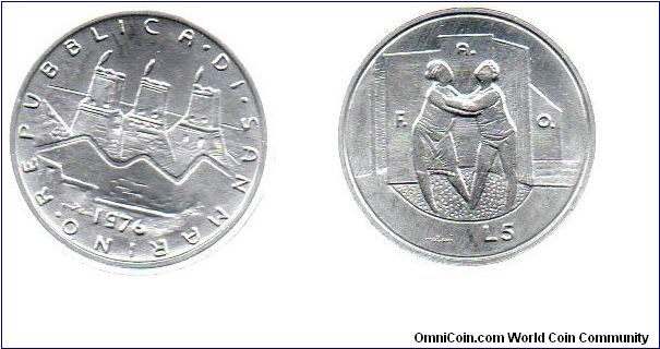 1976 5 Lire - Two people embracing in the home.