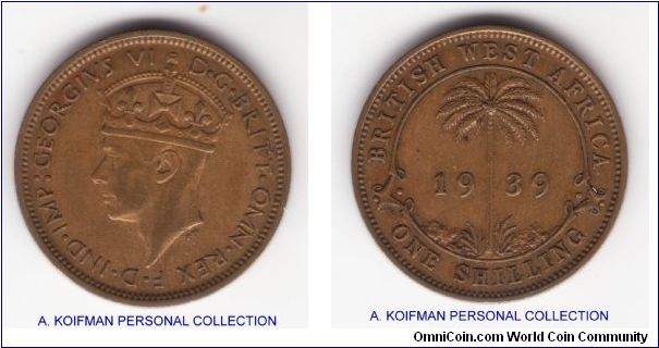 KM-23, 1939 British West Africa shilling; good very fine; toned more brown than red and a bit dirty; nickel-brass with security edge