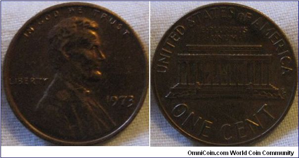 nice bright 1973 cent, possibly a spread on the R (light reflects back off it?)