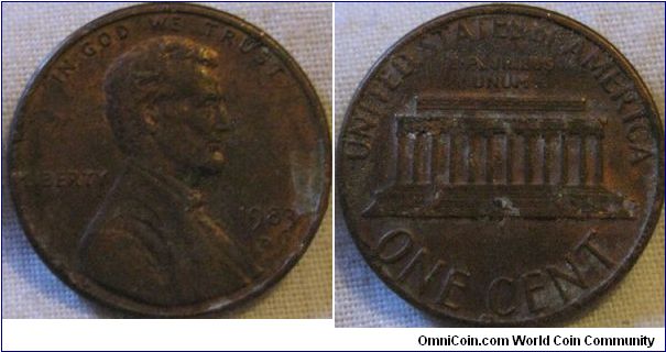 lump on the bottom of the reverse, other then that a normal 1983 D cent