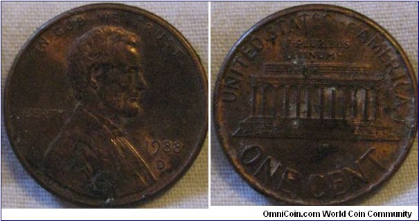 nice 1988 D cent. lustrous, has that white stuff again.