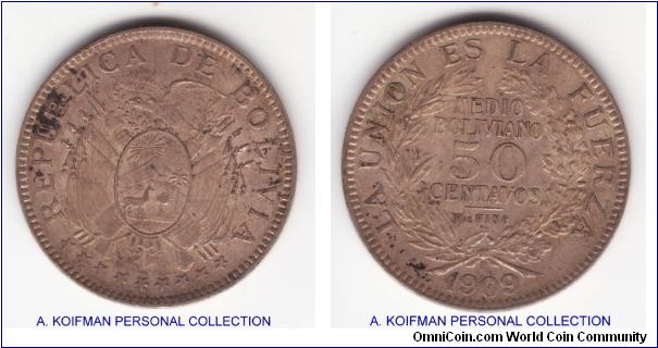 KM-177, 1909 Heaton mint Bolivia 50 centavos or half boliviano; one year issue, not very common as regular previous issues but not rare either with 1,400,000 mintage; reeded edge silver; good very fine to about extra fine condition for wear but has some spots; original toning.