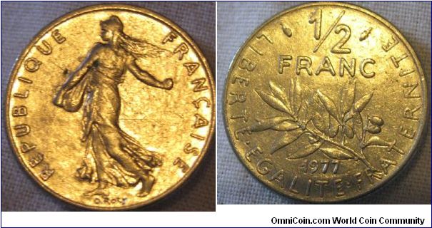 EF and bright 1977 1/2 franc, hard to determine exactly what condition as the metal is always bright, but good details on the obverse makes it a high grade