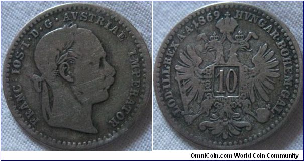 1869 10 krauser fair, but good detals, no wear on the legend