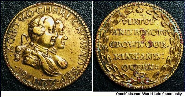 Coronation Medal George III & Charlotte 1761.
24mm Gilt bronze. K. GEO & Q. CHARL. CROWND.SEP.22.1761  Rev. VIRTUE. AND BEAUTY CROWN OUR. KING AND: QUEEN *  BHM# 46. Does not match Brown's description, but the British Museum confirms this is #46