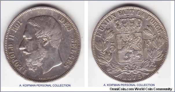 KM-24, 1875 Belgium 5 francs; silver raised lettering DIEU PROTEGE LA BELGIQUE ***'; average circulated large crown size coin, probably in good fine to very fine condition.