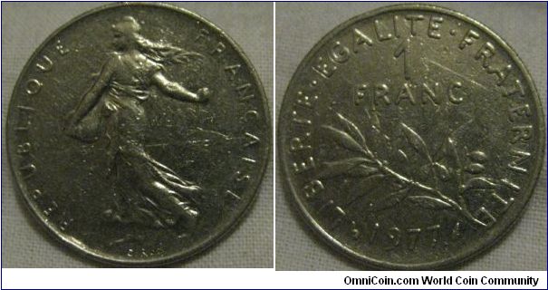 1977 1 franc, no idea why date is higher up, but condition is very nice.