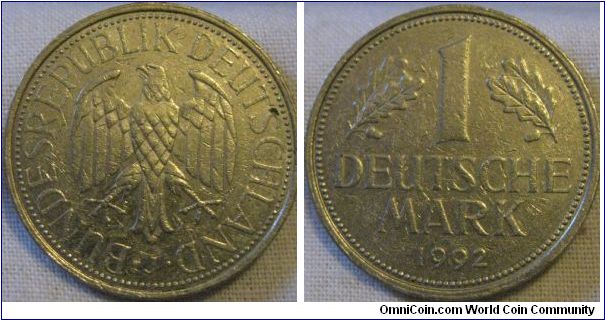 1992 Deutche mark, seems to be made of a lighter metal and has a differant strike from ealier issues, very nice coin