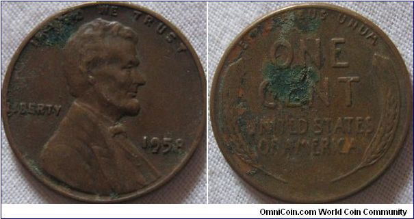possib;e error on the tail of the 9 1958 1 cent, nice coin except for verdigris