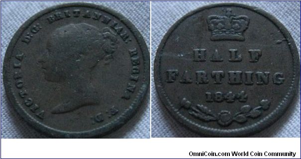 1/2 farthing, fine condition, has a cud on reverse, not too bad a condition, but a very low value coin (about 1/8th of a penny)