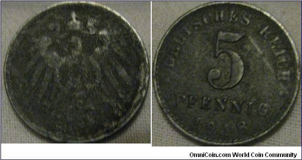 1918 iron 5 pfennig, quite well worn for the few years in circulation, perhaps it was ped and detail has corroded away.