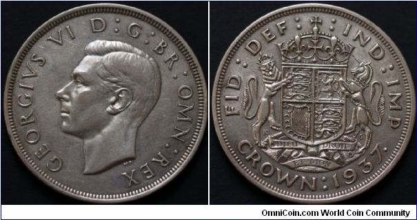 GEORGE VI
Crown, 
First Coinage. Silver, .500 fine, with title IND:IMP Coronation Commerative  Obverse: Bare head L. 
Reverse: Arms and supporters