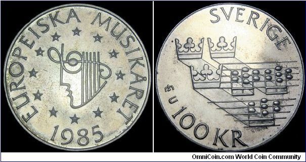 Sweden - 100 Kronor Jubilee coin - 1985 - Silvercoin Ag 0,925 - Ag 0,4785 Troy Ounce - Weight 16 gr - Size 32 mm - Regent / Carl XVI Gustav (1973-) - Engraver / Bo Thorén - Mintage 120 000 - Minted in Eskilstuna / Sweden - Subject / European Music Year - Edge : Plain - Reference KM# 865 (1985)