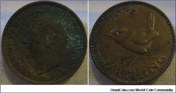 1938 farthing, nice faded lustre traces on reverse, bad corrosion on obverse is a letdown