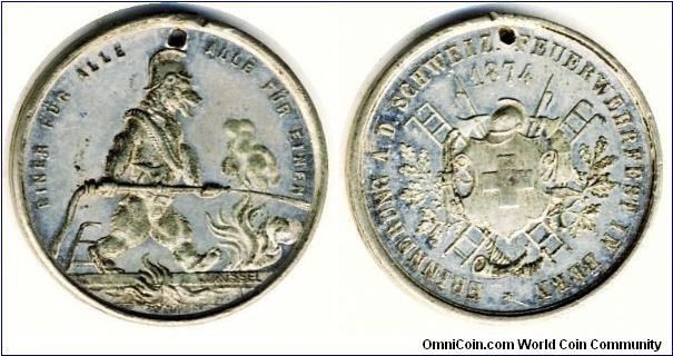 Switzerland Bern, an interesting fire department festival tin medal 1874, holed. 29mm. Interesting bear.