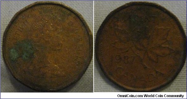 1 cent, corroded looks rusty but otherwise detail is visible