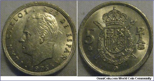 1977 AUNC 5 pesetas, the star does contain the 77 even though it is dated 1973 some scratches