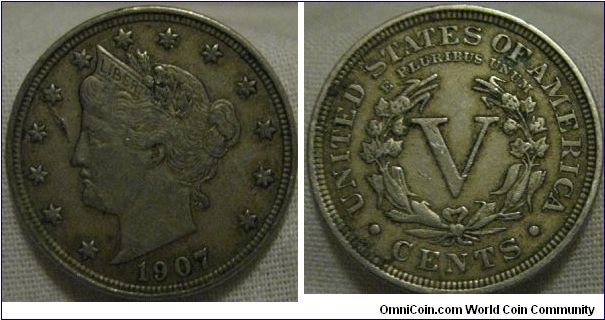 1907 obverse is a sold EF with a metal flaw, however reverse is VF so its a VF coin, also seems to have