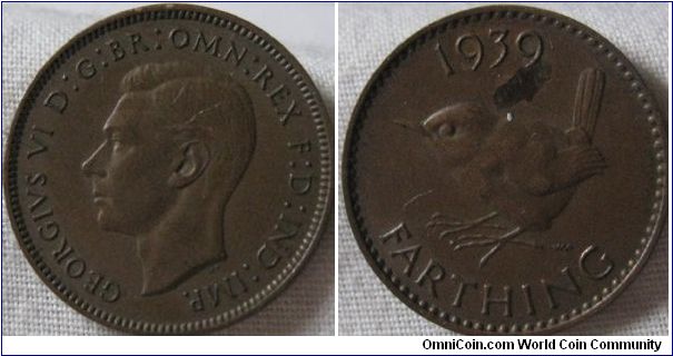 EF 1939 farthing, better details on the hair then the others, some scratches in that area and a mark on reverse